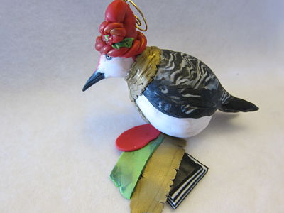 woodpecker ornament with polymer clay samples